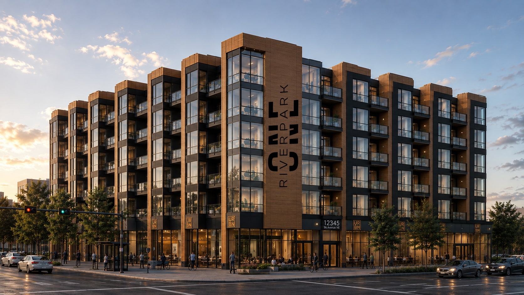 One Riverpark exterior at dusk, with the vertical wordmark and ground-floor retail