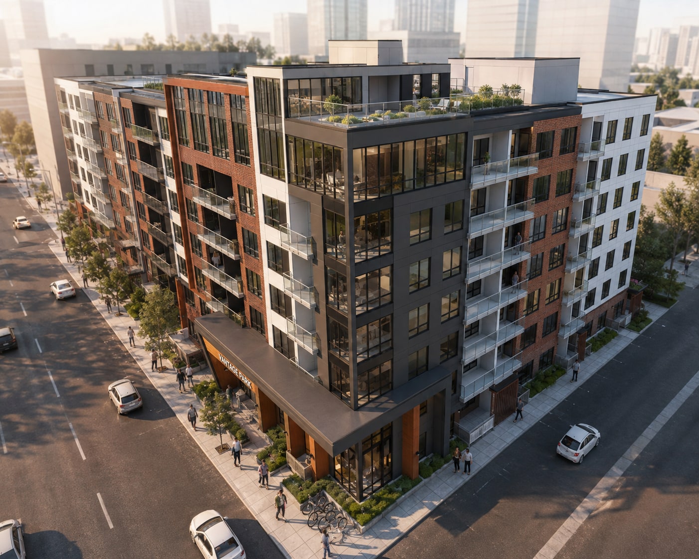 Vantage Park exterior with the lit entrance canopy and rooftop terrace