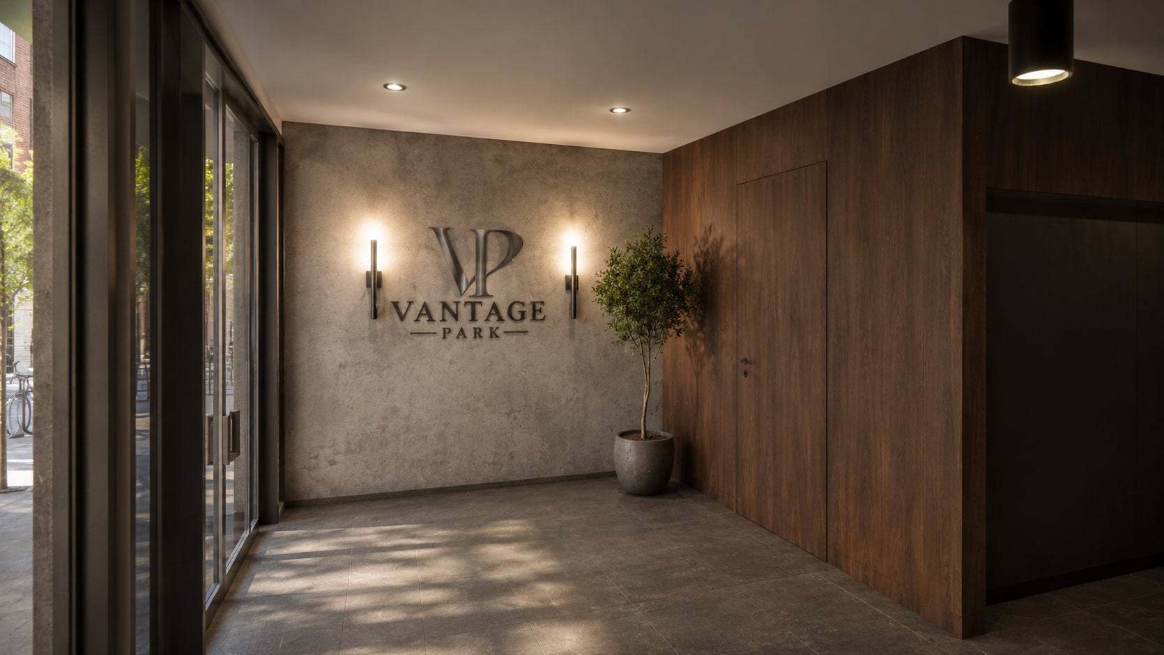 Vantage Park lobby with the wordmark on a concrete feature wall
