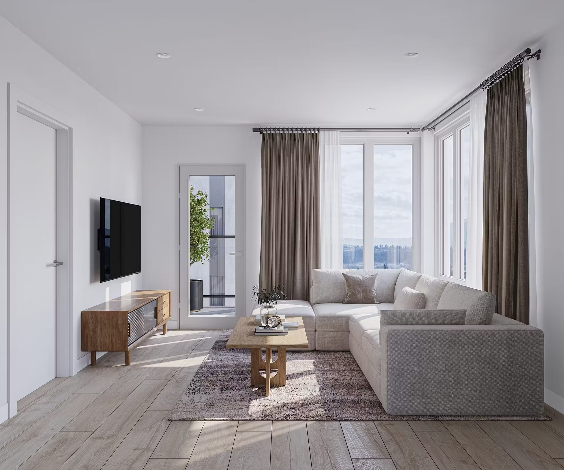 West Windsor suite living room with a sectional and balcony access